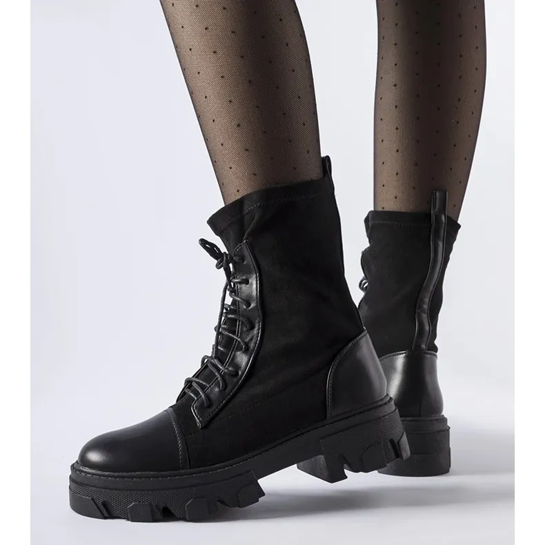 Black slip-on work boots with Tarces black laces.
