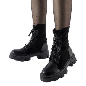 Black slip-on work boots with Tarces black laces.