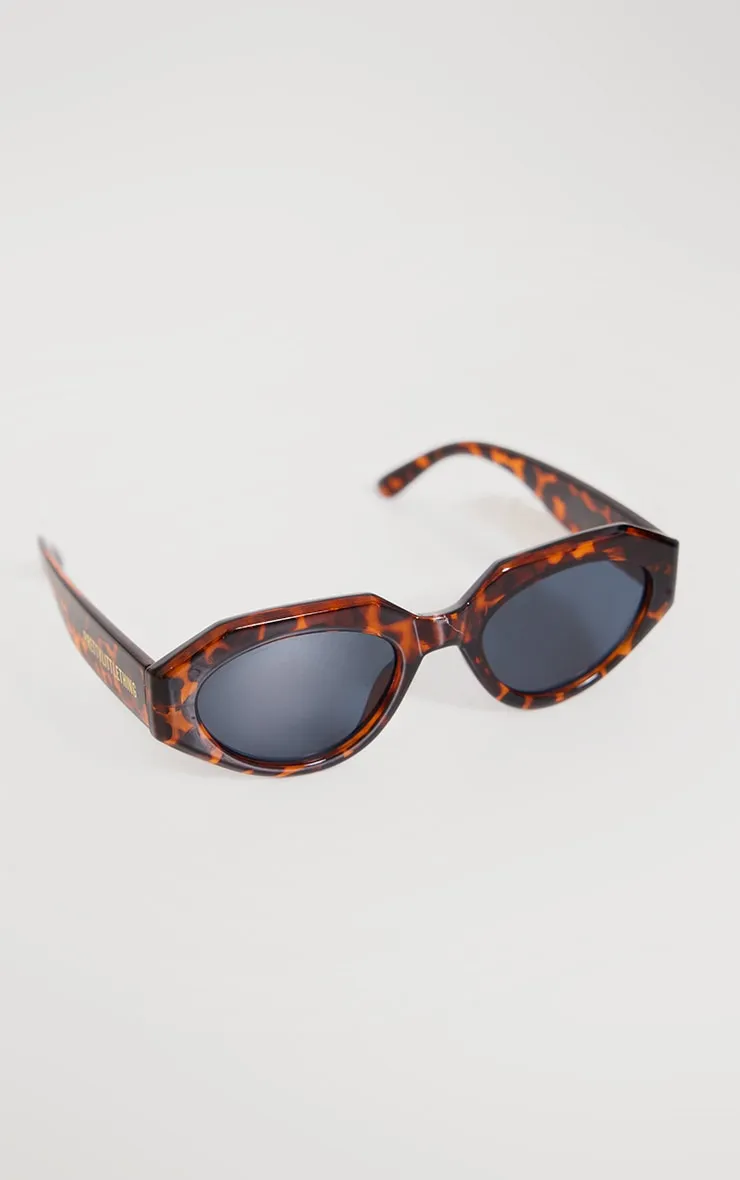 Eye-catching geometric cat-eye sunglasses in tortoiseshell from PRETTYLITTLETHING.